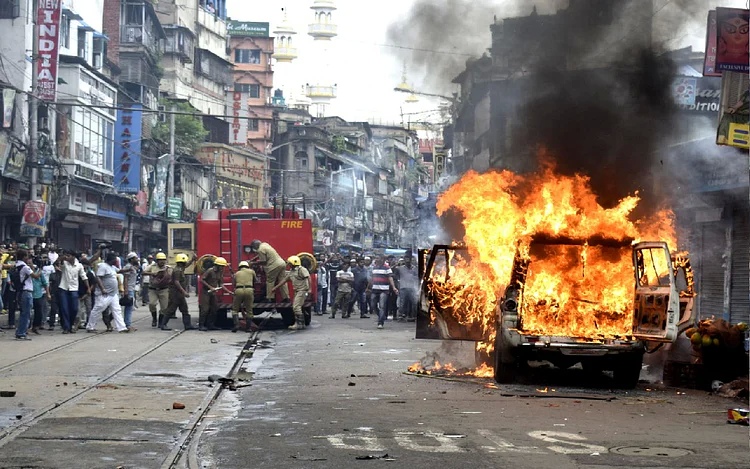 BJP supporters set fire to vehicles