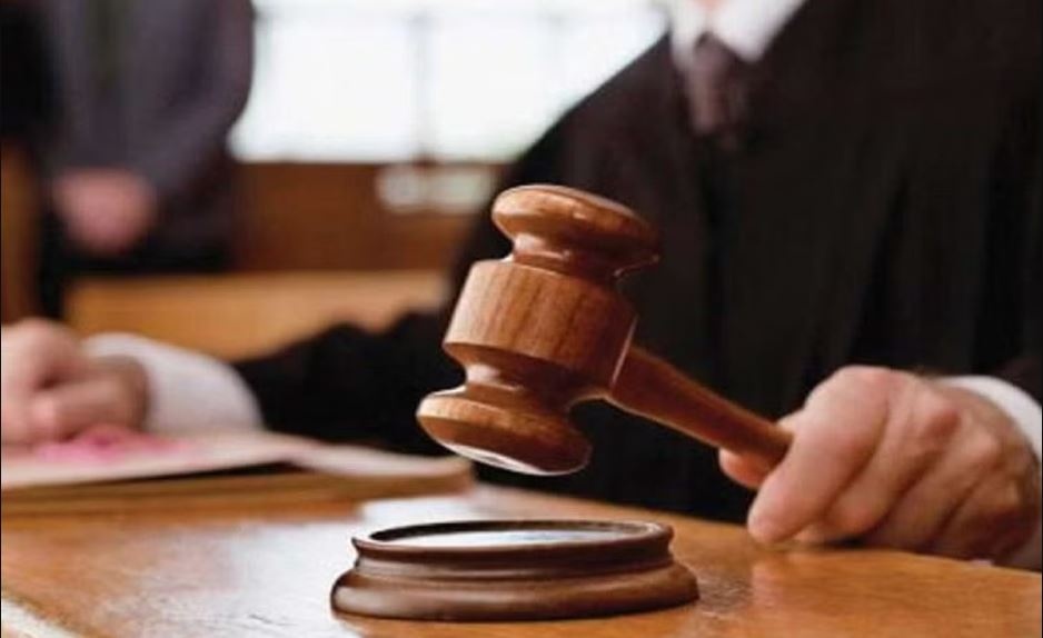 Father dies in police station