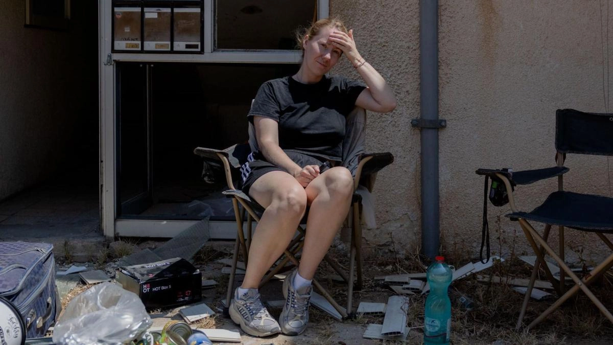 The Israelis that support the attack to Iran in a neighborhood tel aviv beaten by missiles