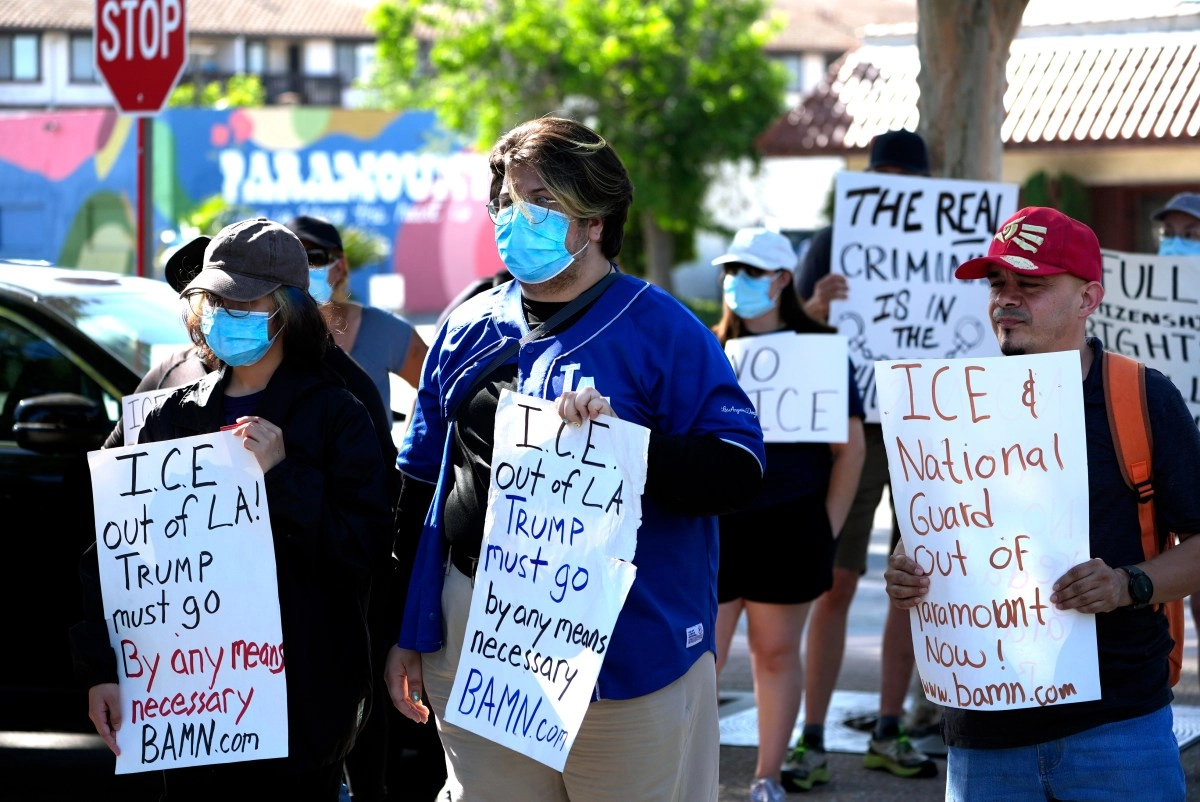 Measures Migratory Trump Divide A The Americans according to pew