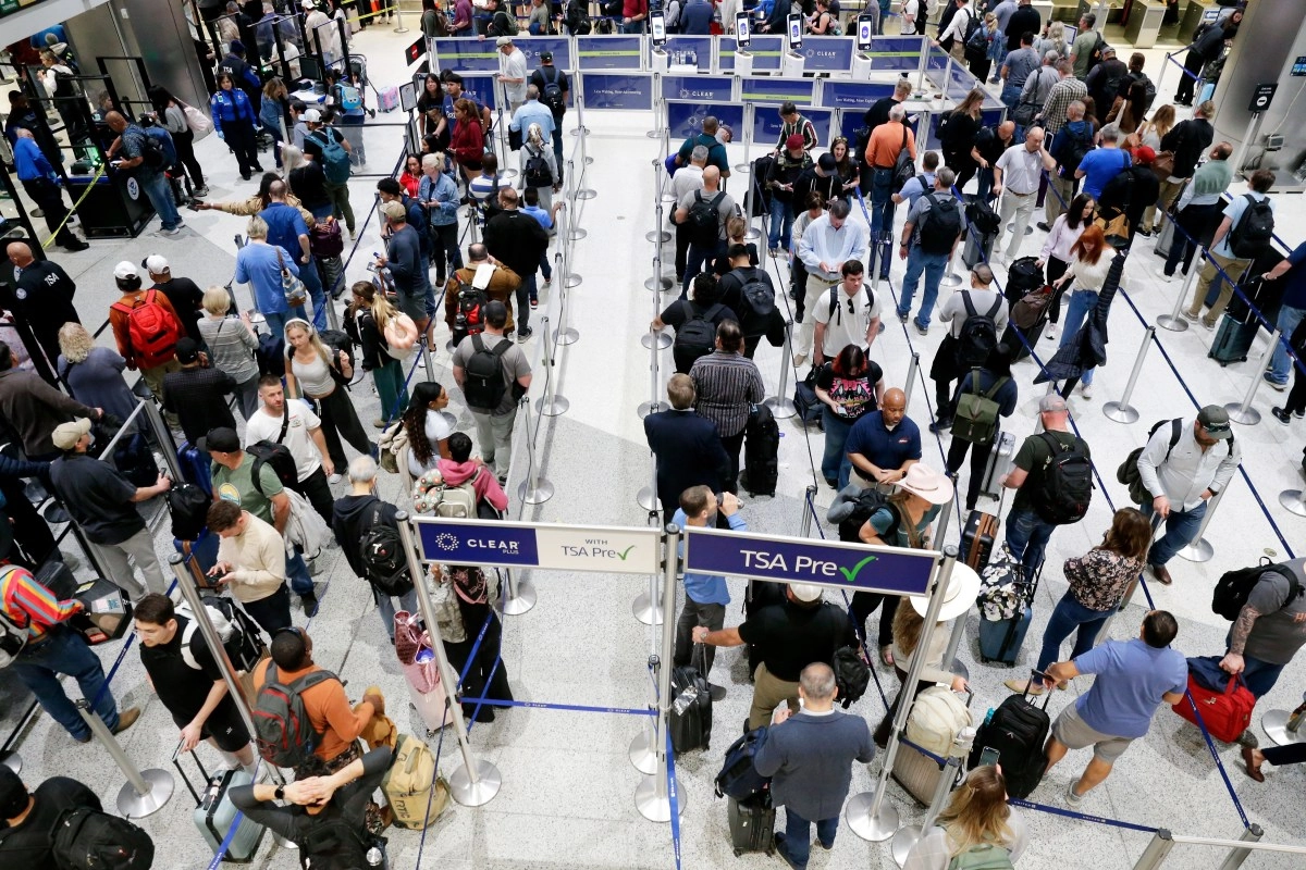 Which airlines allow you to change your flight for free due to chaos at TSA checkpoints