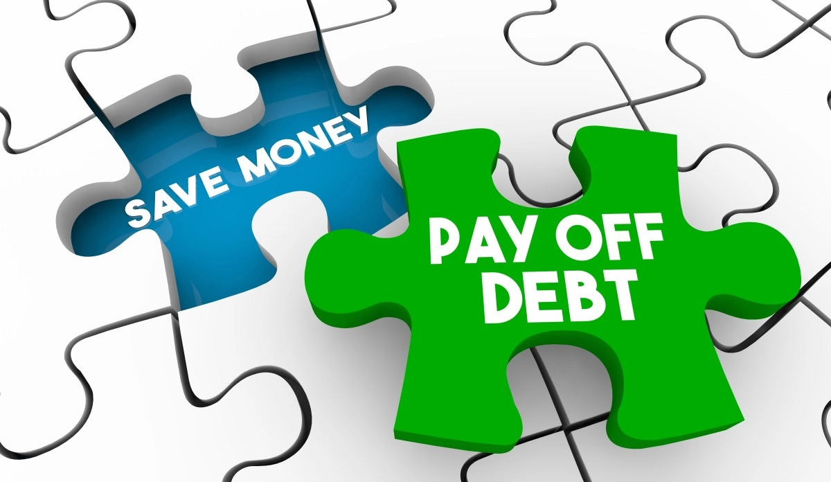 Do you pay the debt with an emergency fund or do you continue saving