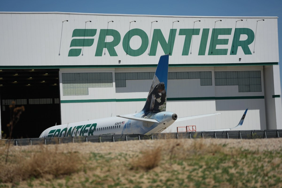 Passenger charged in Miami with attacking Frontier Airlines flight attendant and trying to open plane doors