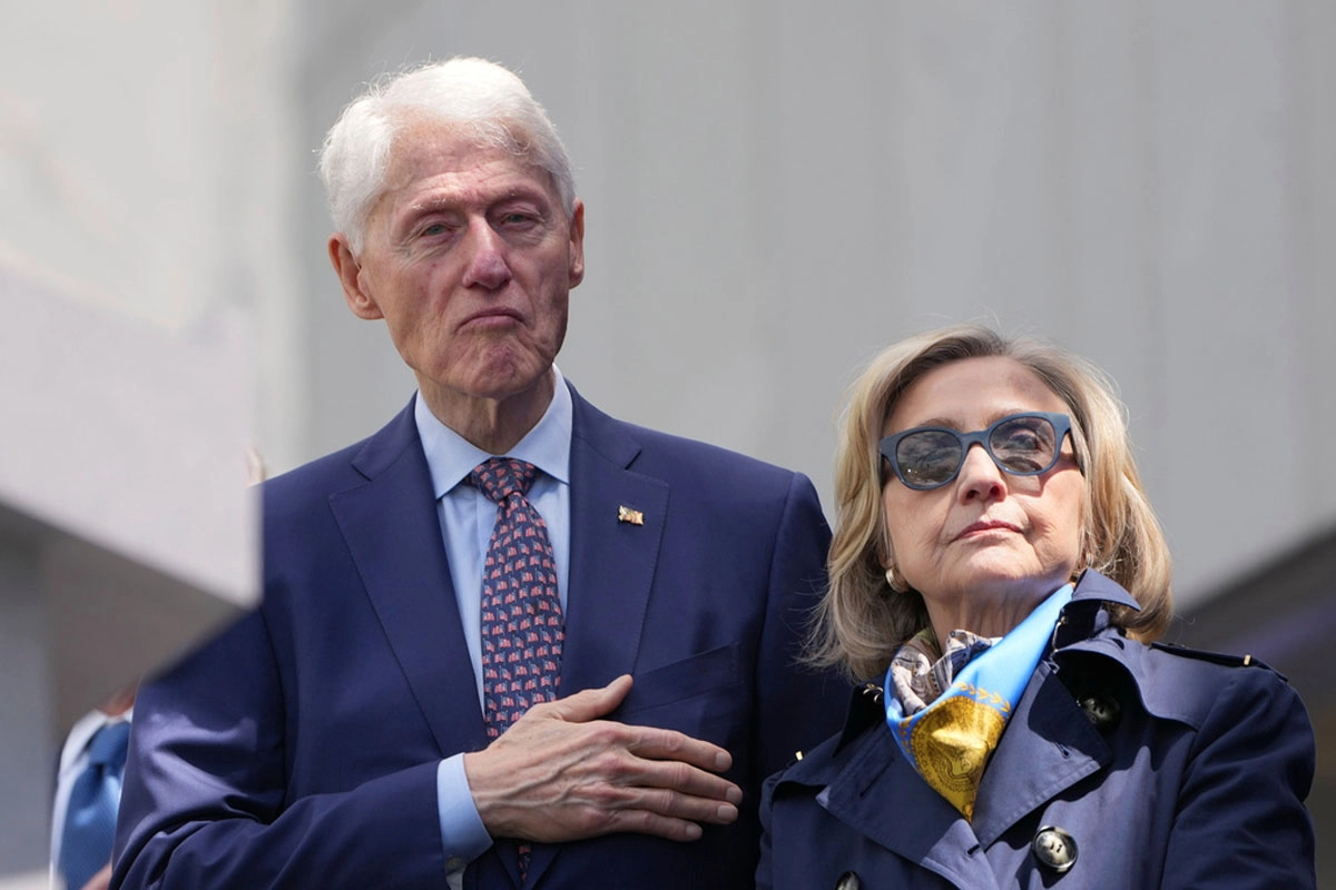 Bill Clinton is caught dozing at the inauguration of Barack Obamas public library