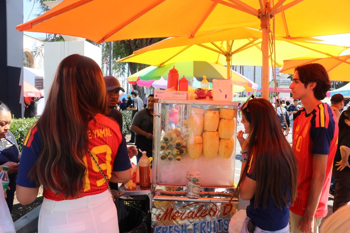 Street vendors drink a bittersweet cup