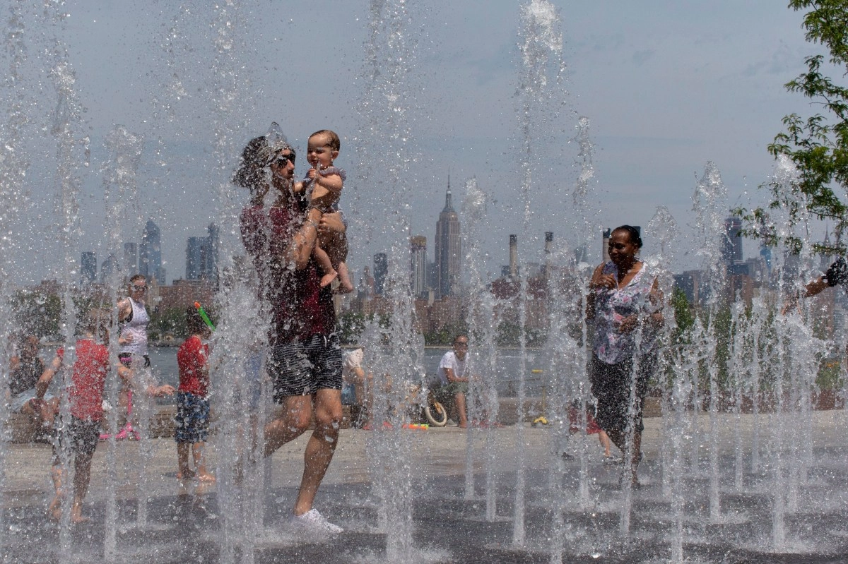 Millions of Americans remain under heat and heavy rain alerts