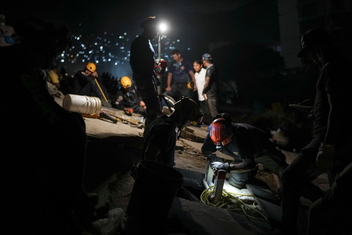 Los Angeles firefighters return after rescuing victims in Venezuela