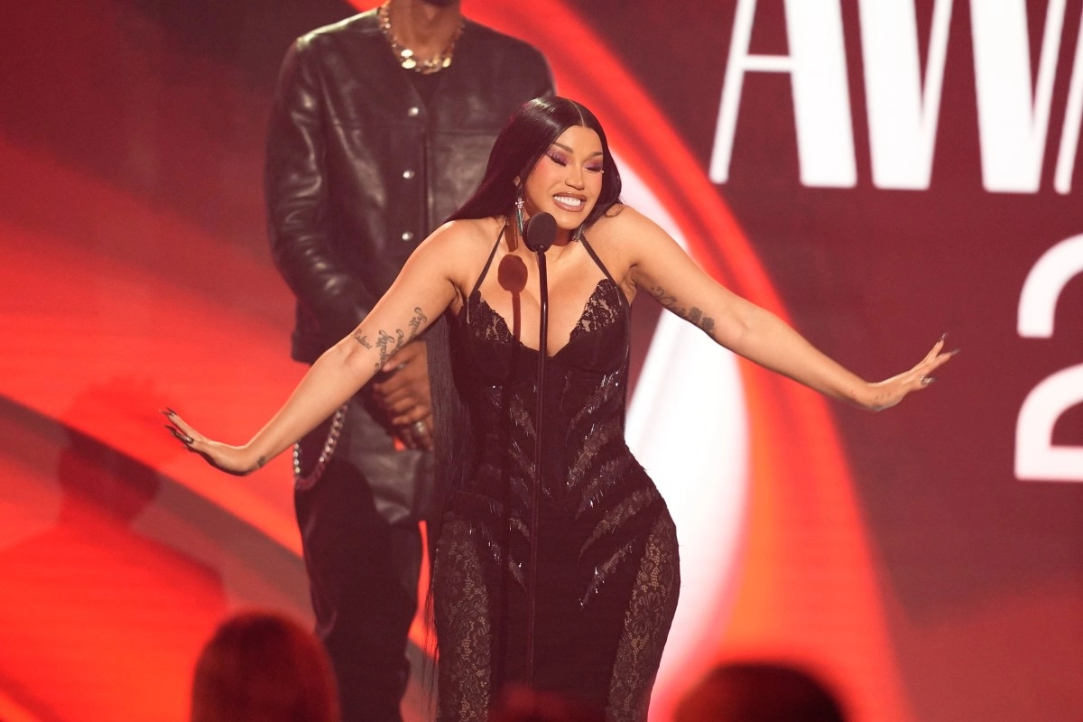Cardi B spotted with mystery man at Paris Fashion Week