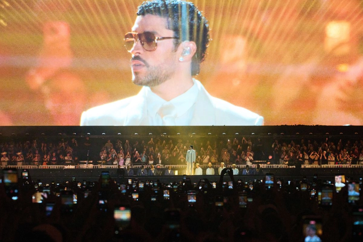 How much did Bad Bunny raise with his I Should Shoot More Photos World Tour