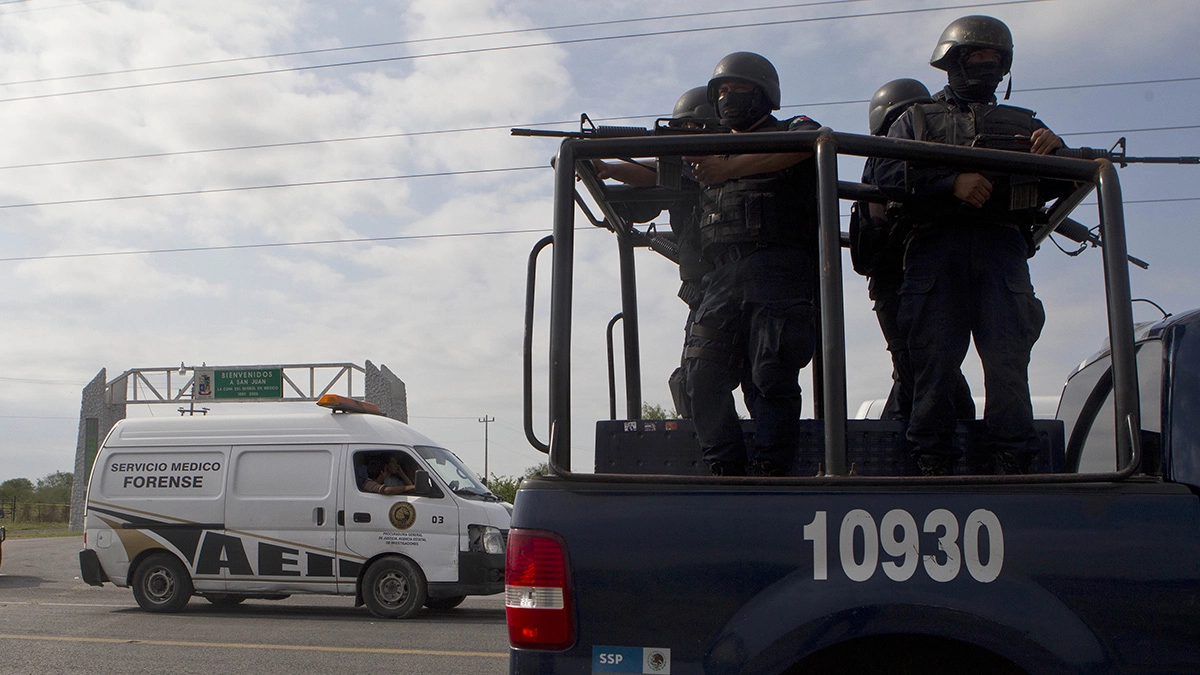 Two mutilated bodies and a drug message are found near a National Guard barracks in Guerrero