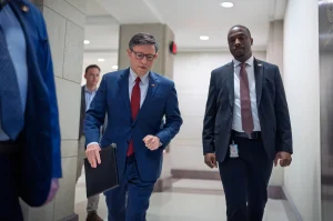 What does the Senate-approved budget package to reopen the government consist of?