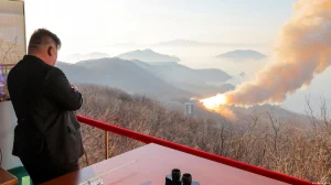 Kim oversees solid fuel rocket engine test