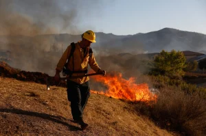 Firefighters battle wildfires in Southern California