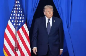 Trump says he is torn between closing a deal or attacking Iran