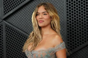 Karol G dazzles on the AMA's red carpet