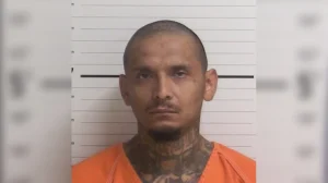 Man arrested for killing New Mexico woman who was gathering evidence to put him in prison