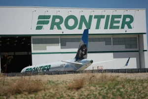 Passenger charged in Miami with attacking Frontier Airlines flight attendant and trying to open plane doors