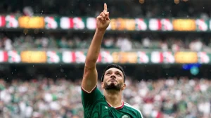 Raúl Jiménez cries after his first goal in a World Cup and dedicates it to his recently deceased father